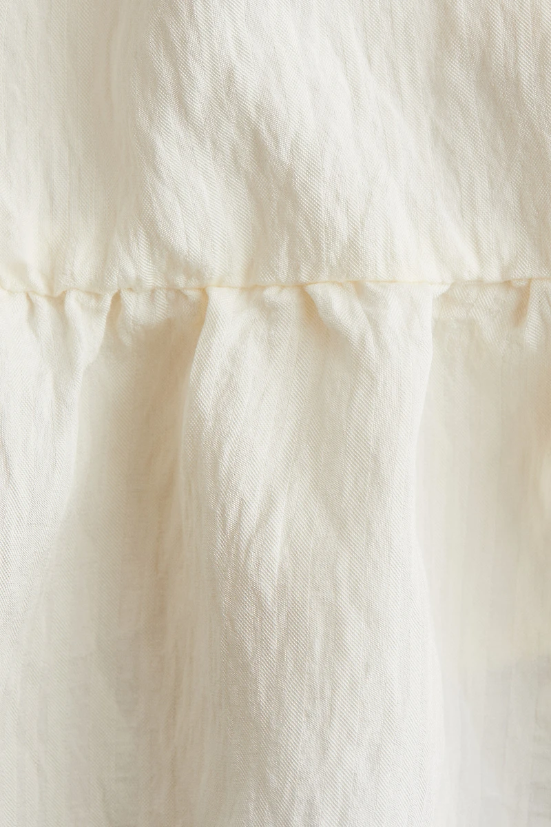 Bow-Detail Peplum Top