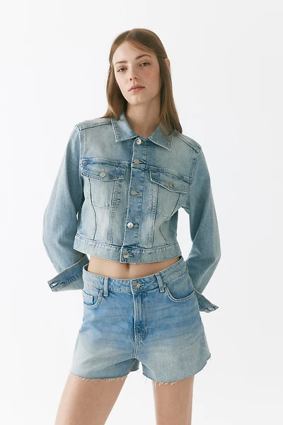 Raw-edge denim shorts
