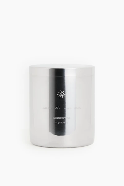 Bougie parfumée dans un pot en acier inoxydable