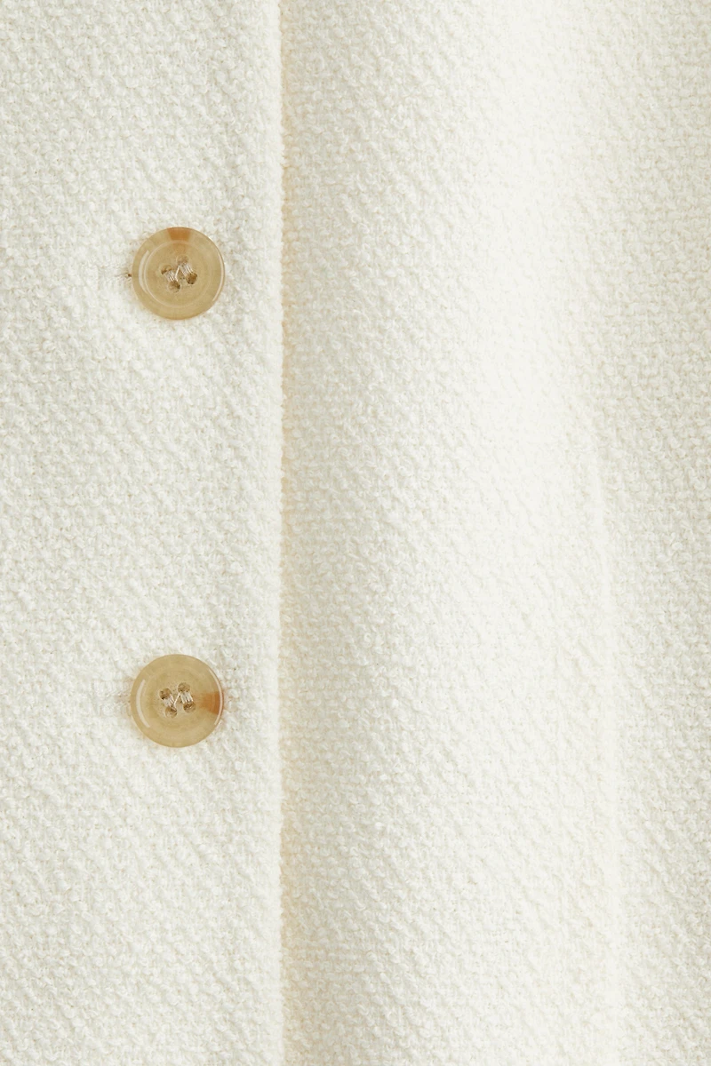 Longue robe à boutons en bouclé