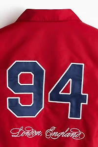 Veste de survêtement brodée ample en nylon