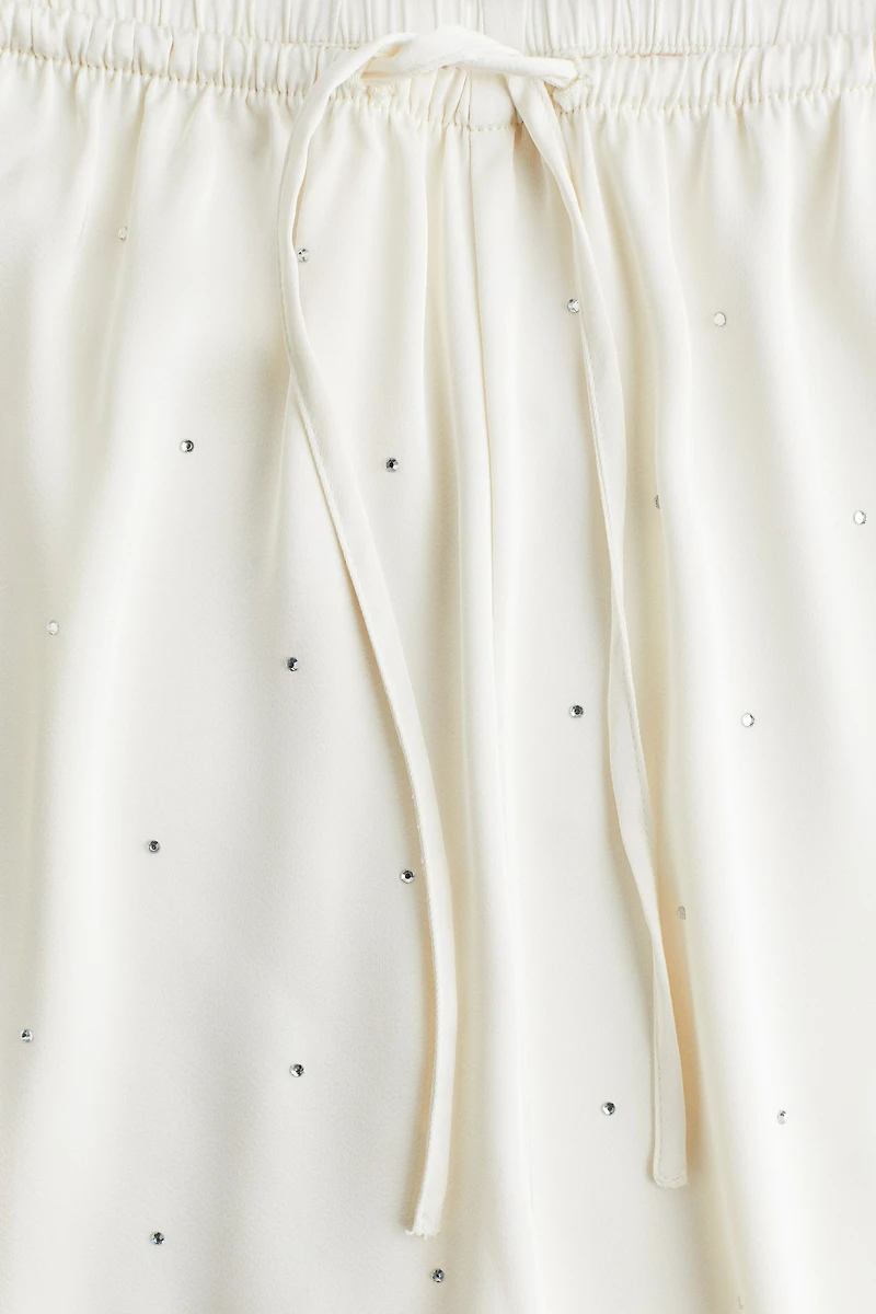 Pantalon de pyjama ornementé en satin