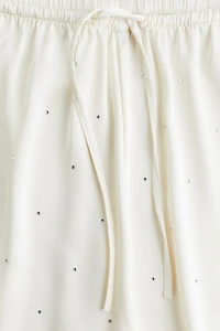 Pantalon de pyjama ornementé en satin
