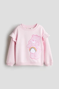 Ruffle-Trimmed Printed Sweatshirt