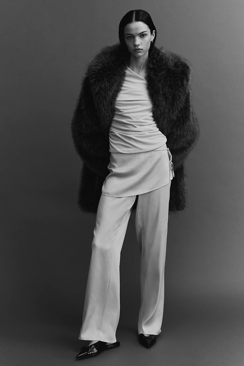 Pantalon en satin avec jupe superposée