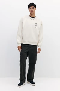 Chandail ample en molleton imprimé