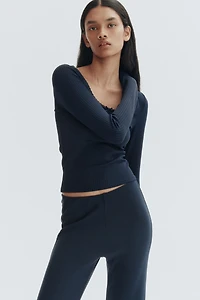 Flared fine-knit trousers