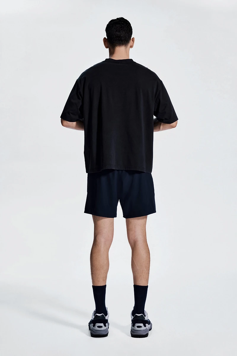 Mid-Length Sports Shorts with DryMove™