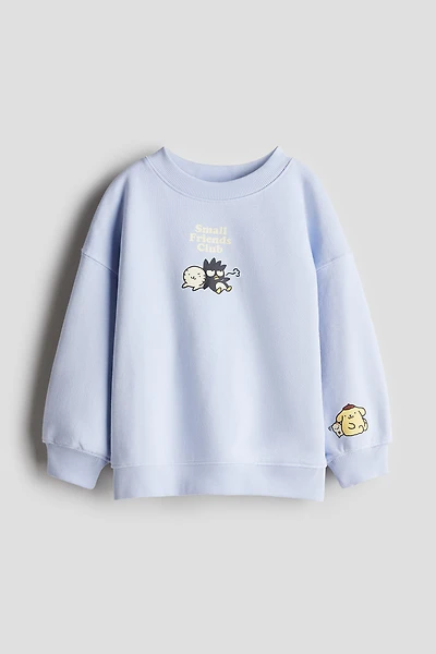 Chandail en molleton avec motifs imprimés