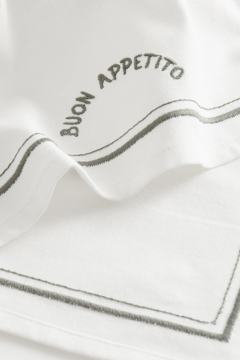 Linge à vaisselle avec motifs brodés
