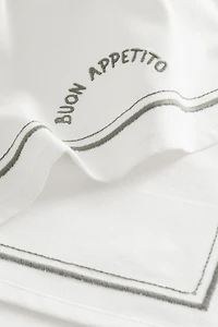 Linge à vaisselle avec motifs brodés