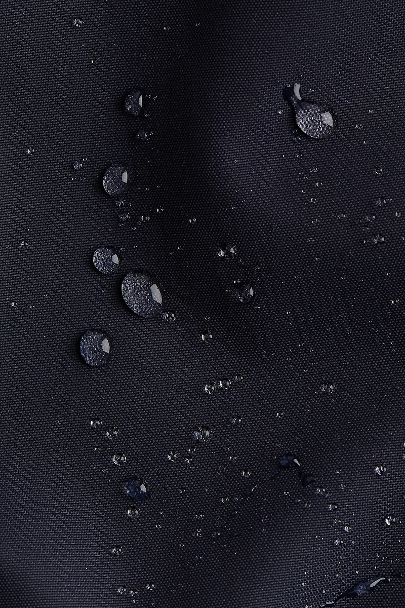 Parka s'ajustant à la croissance résistant l'eau