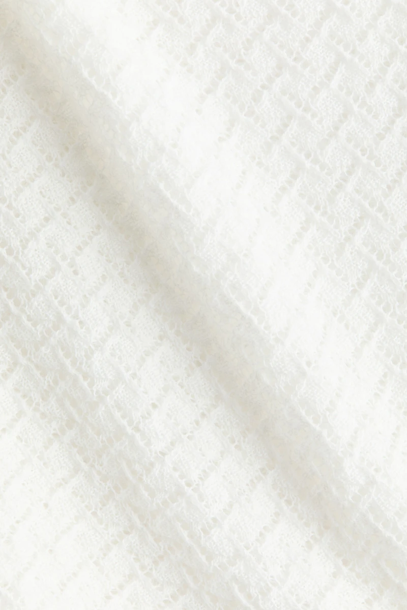 Robe de plage en tricot pointelle