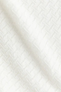 Robe de plage en tricot pointelle