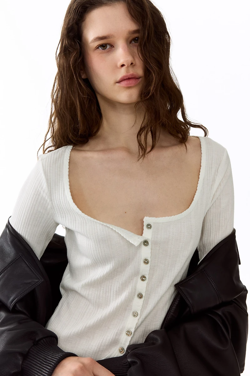 Haut en tricot pointelle