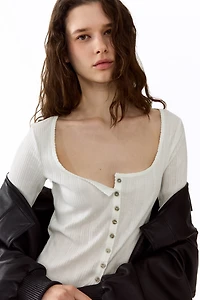 Haut en tricot pointelle