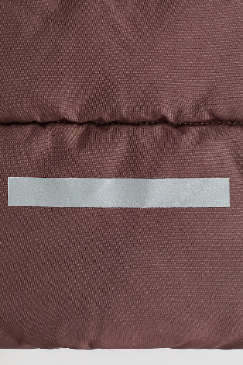 Veste matelassée sans manches avec capuchon