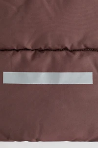 Veste matelassée sans manches avec capuchon