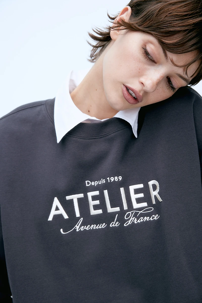 Sweatshirt with Text Motif
