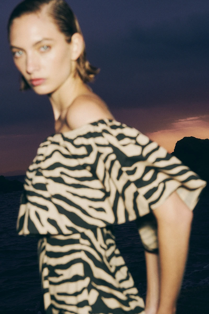 Flounced off-the-shoulder dress