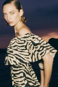 Flounced off-the-shoulder dress