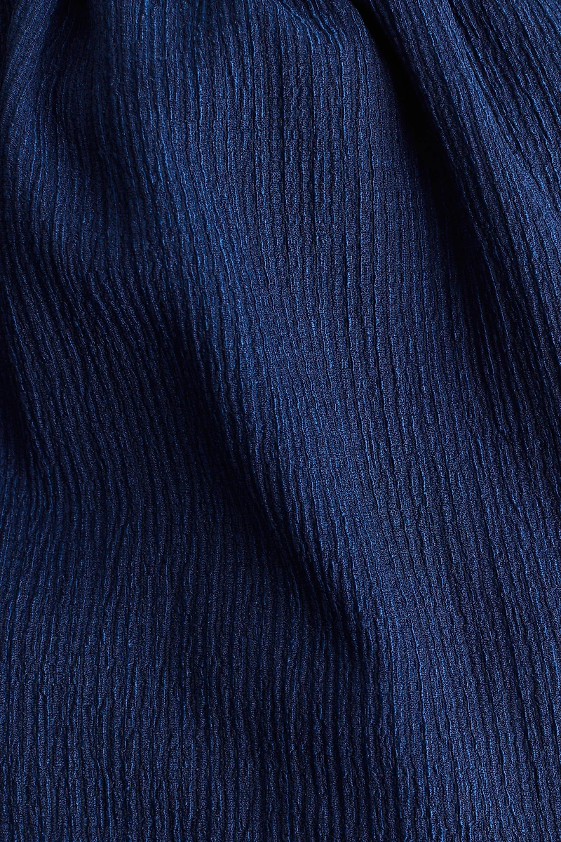 Haut court épaules nues