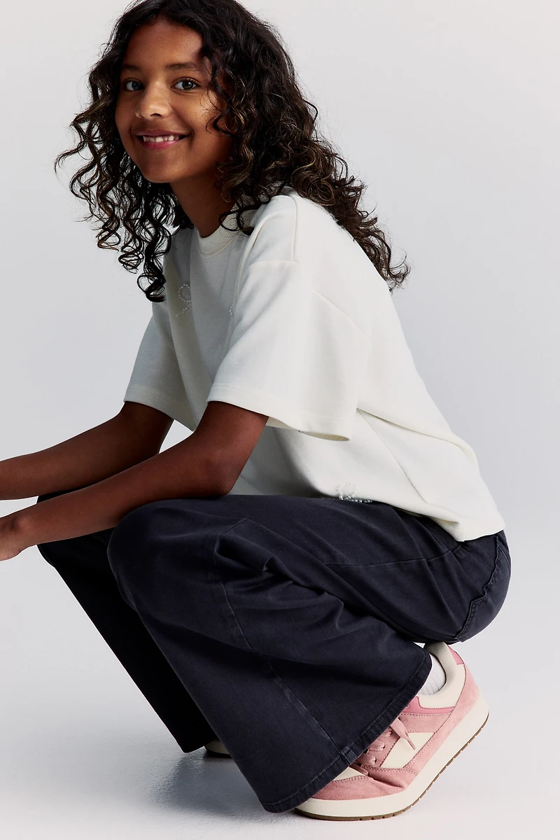 Pantalon à jambes larges en sergé