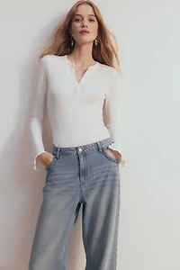 Trumpet-Sleeved Pointelle Bodysuit