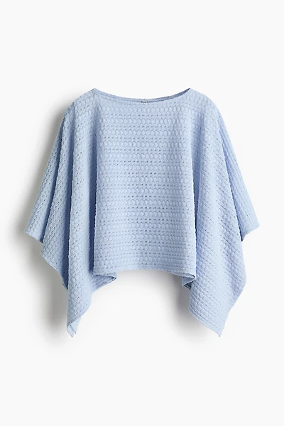 Haut cape en tricot texturé