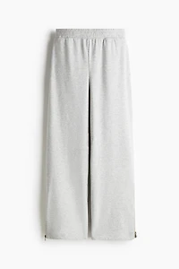 Pantalon en molleton à fermeture éclair au bas