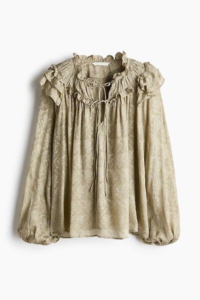 Blouse à bords plissés avec détails nouer