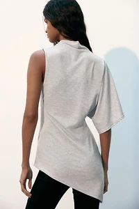 Haut asymétrique avec col cheminée