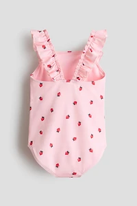 Maillot de bain texturé à bords volantés