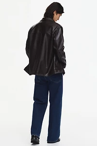 Veste en tissu enduit