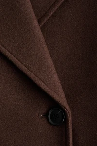 Manteau à fermeture croisée