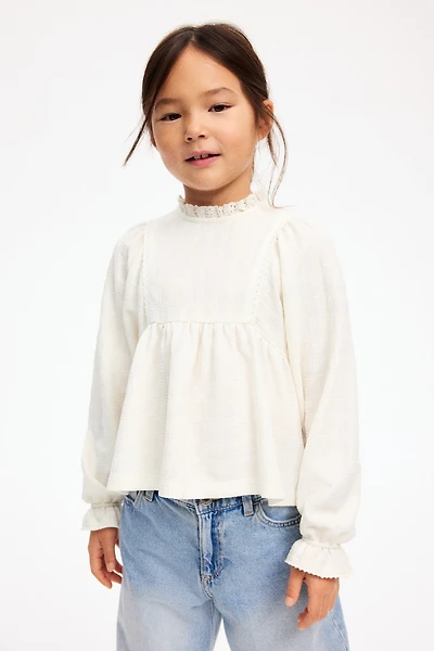 Blouse en jersey texturé