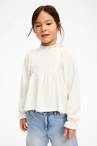 Blouse en jersey texturé