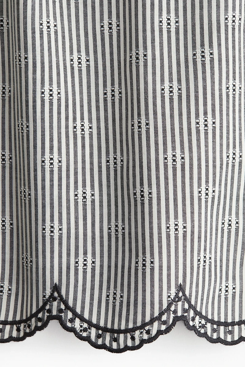 Embroidered tie-strap top