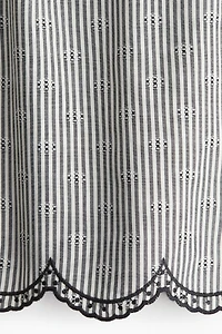 Embroidered tie-strap top