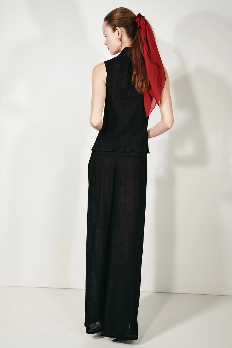 Haut avec détail style écharpe