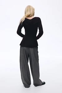 Haut péplum en tricot côtelé