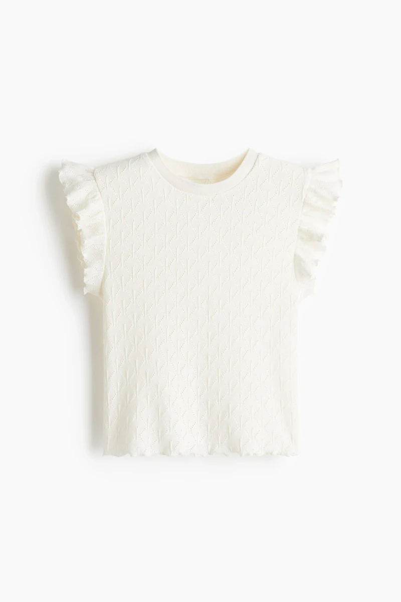 Haut à manches volants