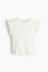 Haut à manches volants