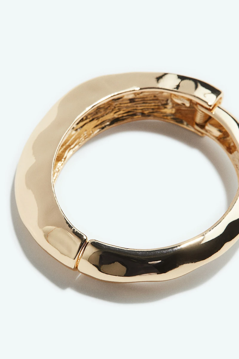 Bracelet asymétrique à charnière