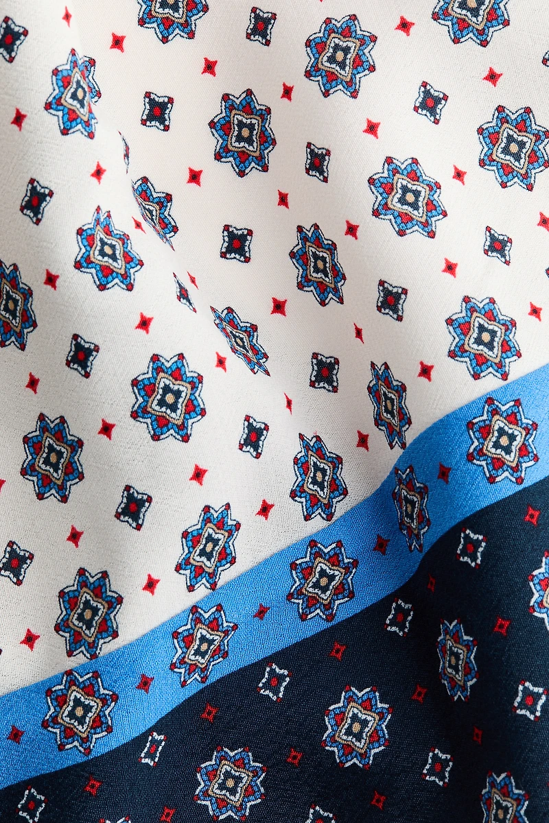 Haut dos nu en satin