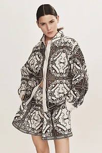 Veste avec broderie anglaise