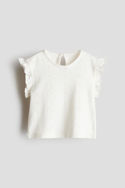 Haut avec broderie anglaise