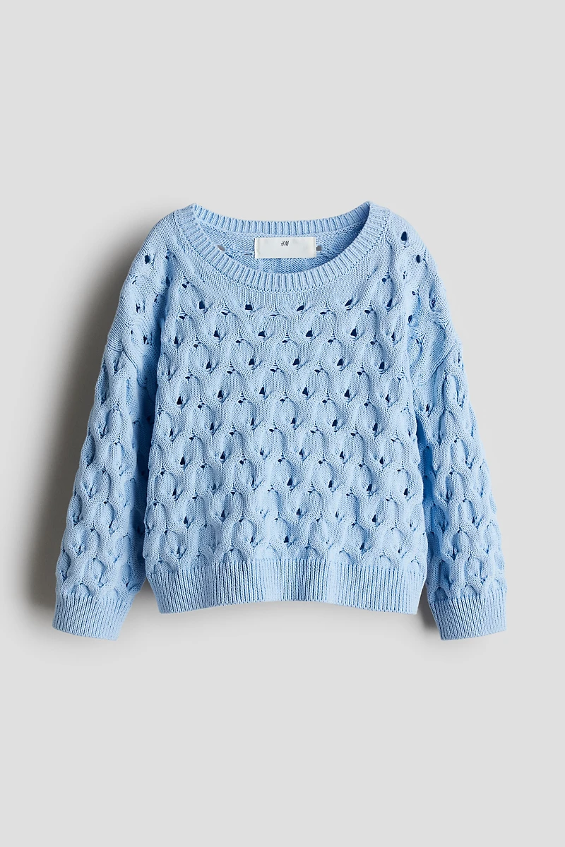 Chandail en tricot ajouré