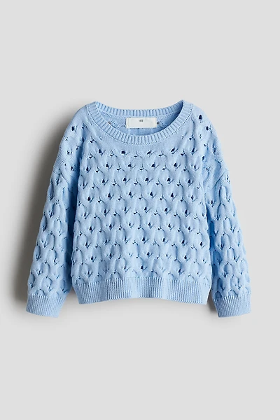 Chandail en tricot ajouré