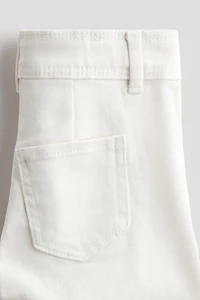 Pantalon évasé avec perles de fantaisie